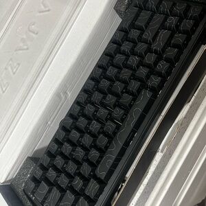 Black Mechanical Keyboard with Subtle Gray Topographic Pattern